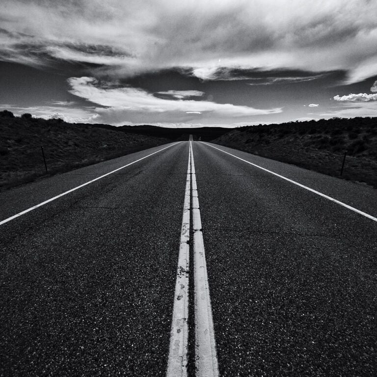 Highway 40. When people think of Colorado, I think they think of rainy mountains that touch the sky. In North west Colorado lies desert grassland. This area has rolling mountains lacking in towering rock peaks, wet grass, or tall trees. instead you get red desert rock, small hedges, and dry arid land. 

This road reminded me of those songs about driving down highways in America and being totally free.