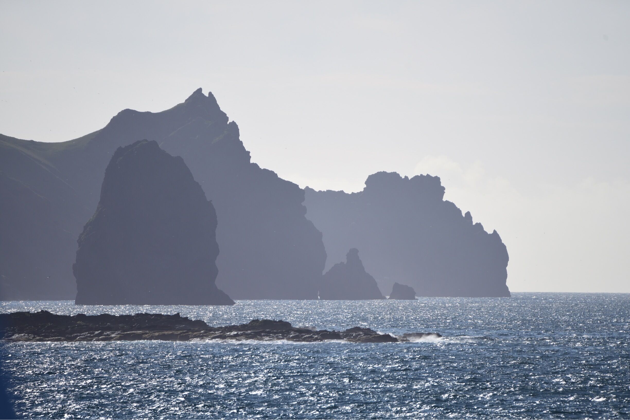 Chain island's of Vestmann. The biggest and inhabited one is Heimaey. The new island was formed in 1968 and taken under protection by UNESCO in pursuit of investigation of how life develops on an uninhabited island. Heimaey is also a home for the greatest number of puffins in Iceland. 