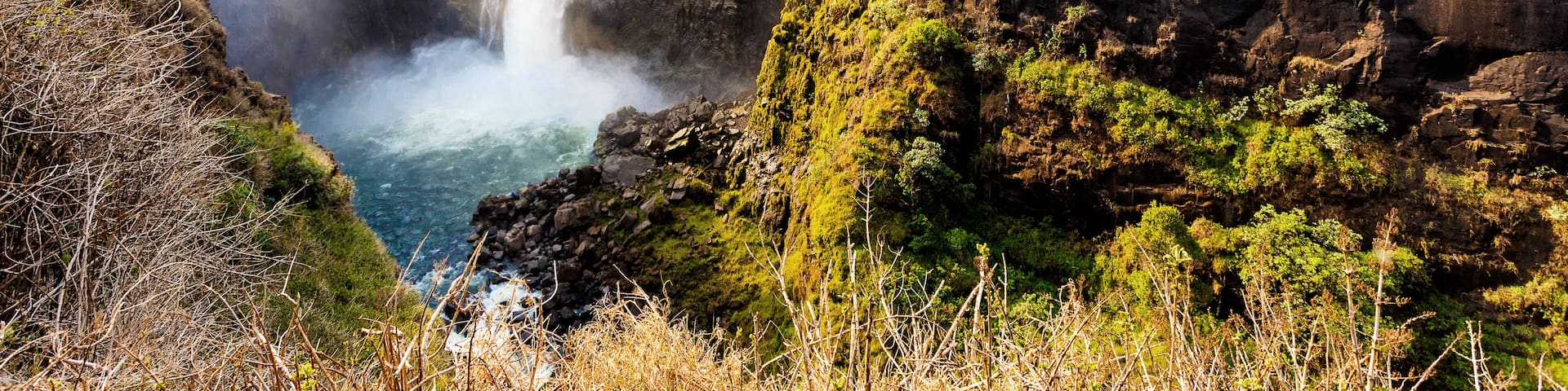 The Victoria falls is the largest curtain of water in the world (1708 meters wide). The falls and the surrounding area is the National Parks and World Heritage Site - Zambia, Zimbabwe ; Shutterstock I