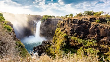 The Victoria falls is the largest curtain of water in the world (1708 meters wide). The falls and the surrounding area is the National Parks and World Heritage Site - Zambia, Zimbabwe ; Shutterstock I
