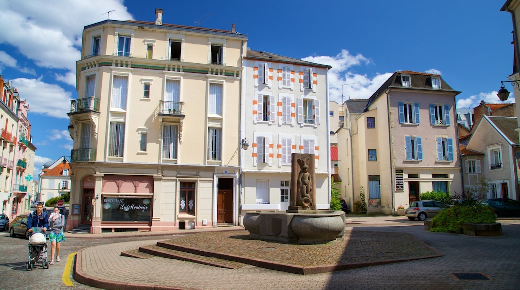 Vichy featuring lähde ja katunäkymät sekä perhe