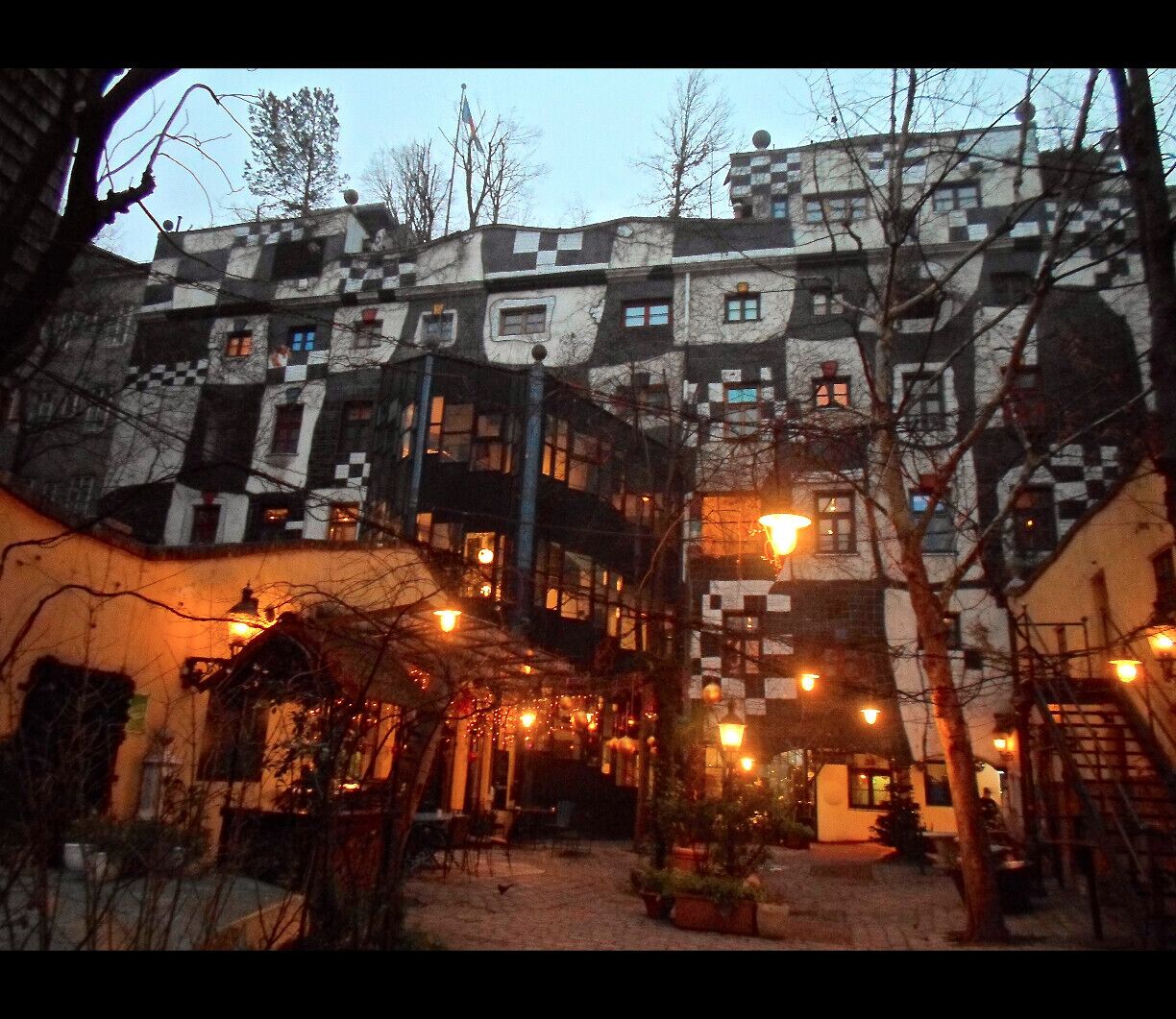 #TroveOn Backyard of the KunstHaus (art museum). The building is an incredible work of art in itself!