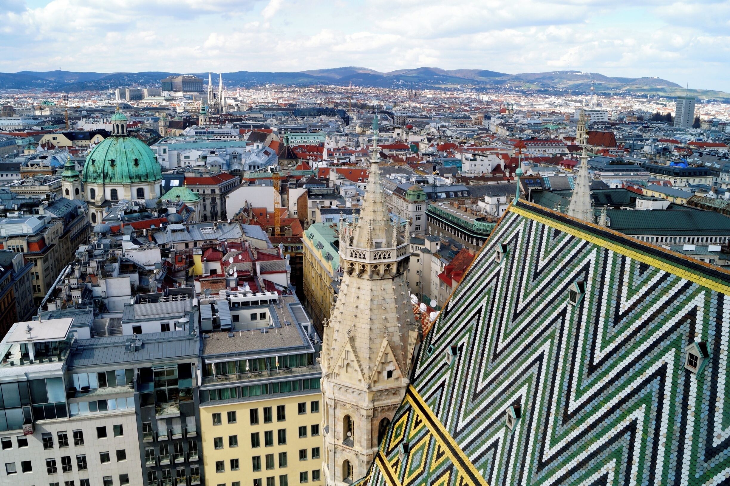 View over Vienna from the south tower of the St. Stephen's Cathedral (St. Stephansdom). You have to climb 343 steps up a very narrow spiral staircase to the Türmerstube, from where you can enjoy this view over the roofs of Vienna. Entrance fee was 4,50€ in spring 2015.