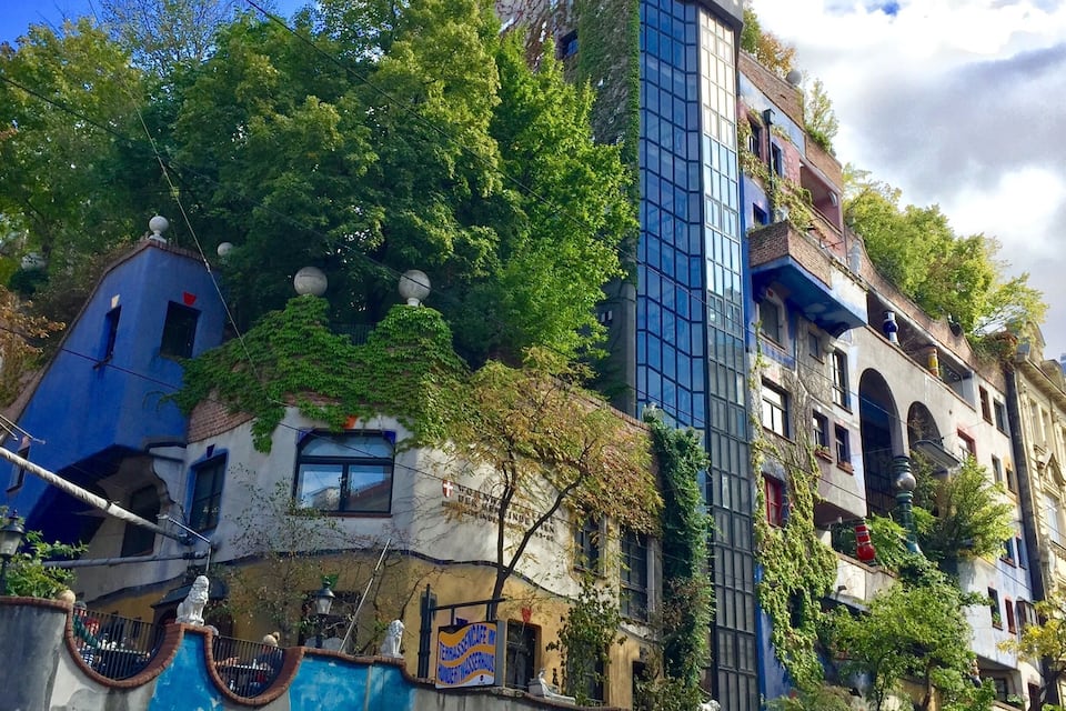 A building with a unique architectural style, featuring a mix of modern and traditional elements.