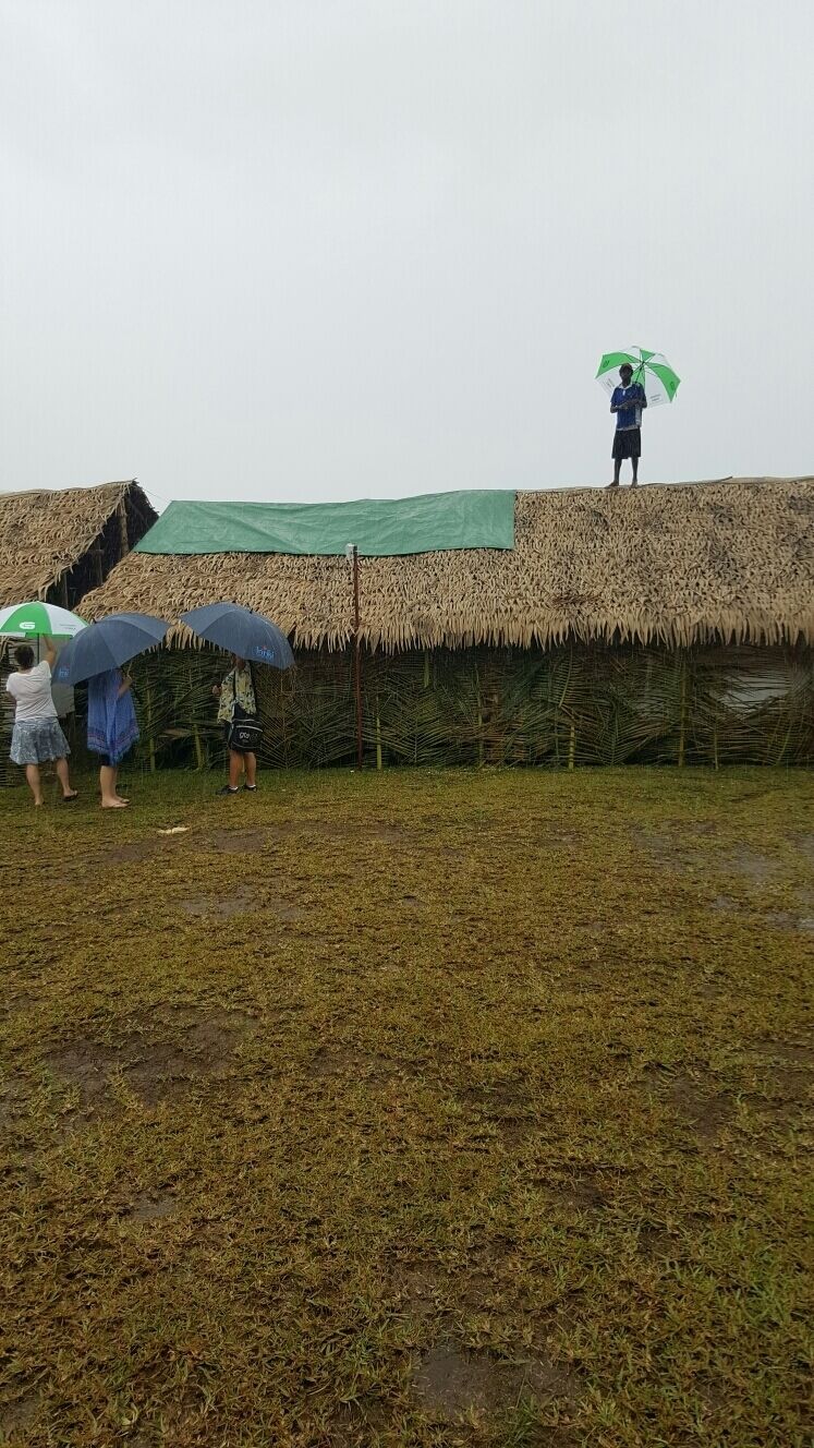 2016...busy with trade event outside in this weather.....they believe standing with an umbrella on top of the roof will stop the rain😎