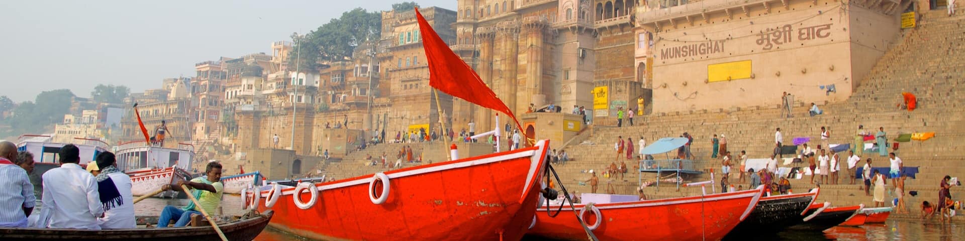 Varanasi which includes boating, a bay or harbor and a coastal town