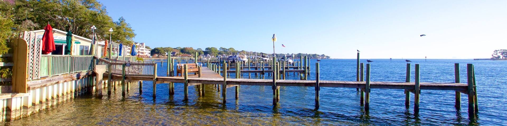Fort Walton Beach which includes a sandy beach and a bay or harbor