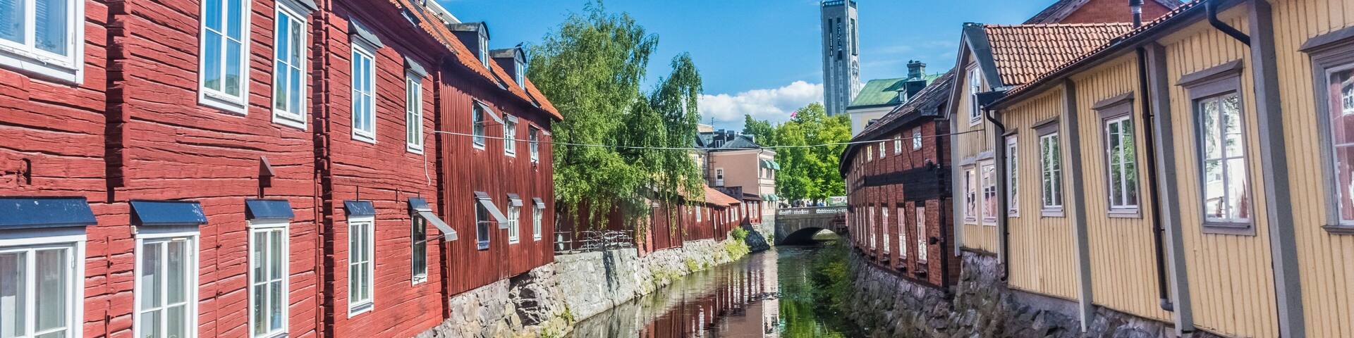 Colorful houses by the canal in the city center of Vasteras, Sweden