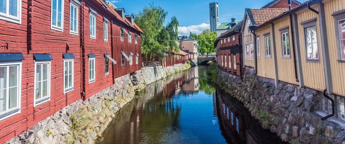 Colorful houses by the canal in the city center of Vasteras, Sweden