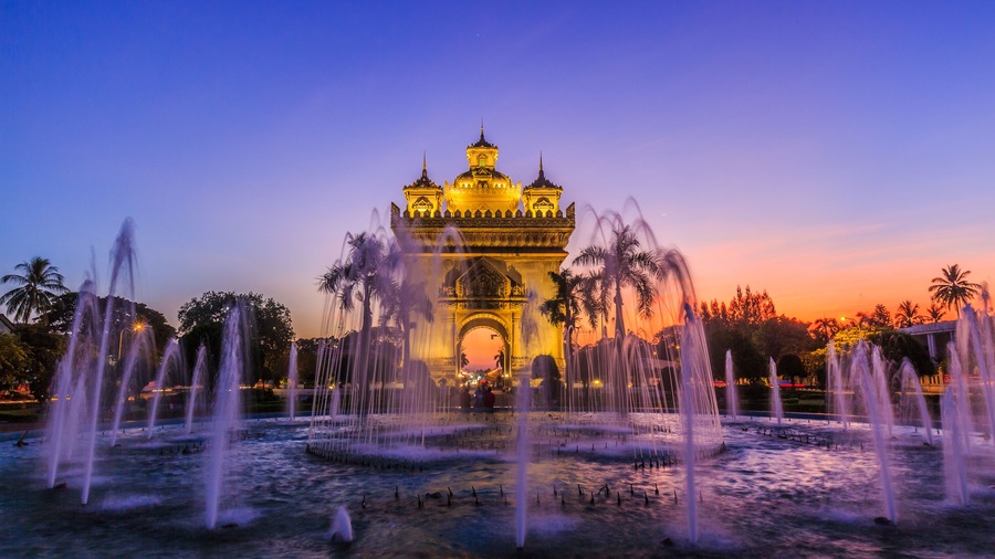 Patuxai monument or Patuxay Monument at twilight in Vientiane, Laos., Shutterstock ID 728129395, Purchase Order: SP-1900, Order Number: SP-1900 Go Guides, Client/Licensee: Hotels.com, Other: Supattra