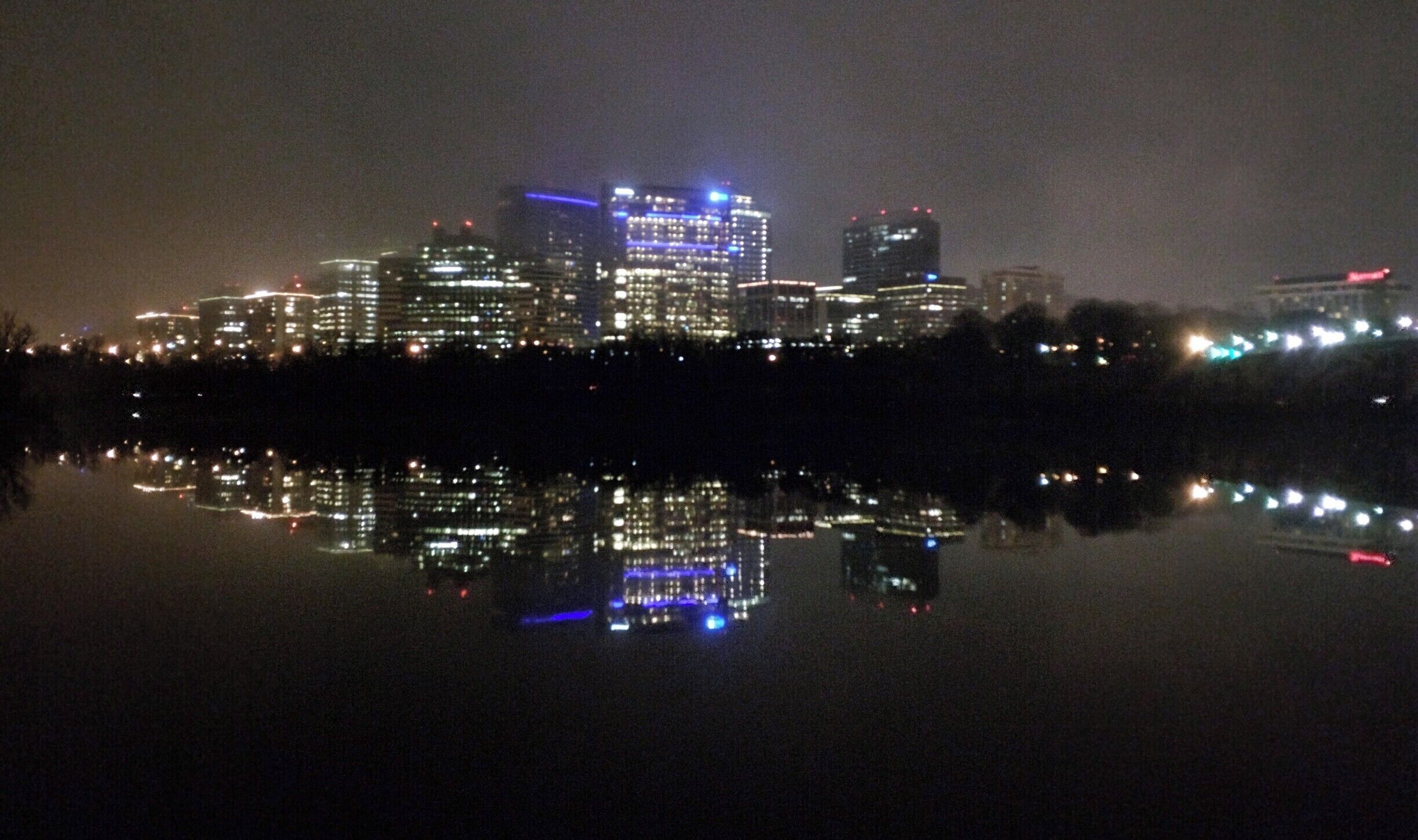 View of Rosslyn, VA, across the Potomac River from Georgetown. That evening the river was placid, setting the scene for a picture perfect reflection of the skyline.