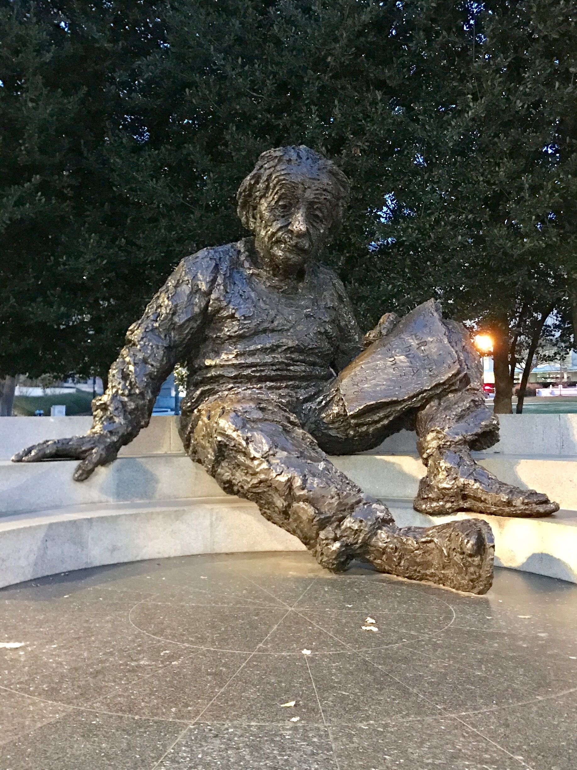 The Albert Einstein Memorial is a monumental bronze statue depicting Albert Einstein seated with manuscript papers in hand by sculptor Robert Berks. It is located in central Washington, D.C., in a grove of trees at the southwest corner of the grounds of the National Academy of Sciences at 2101 Constitution Avenue N.W., near the Vietnam Veterans Memorial.