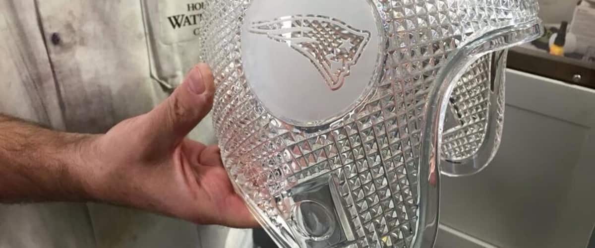 Getting a peek at the unfinished Waterford Crystal helmet of the Super Bowl Champions, the New England Patriots.