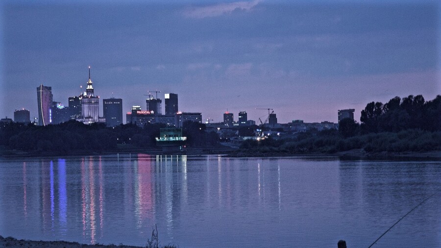 There is a running/biking path that runs the length of the Vistula in Warsaw. I cannot remember the exact location of this particular spot along the river, but I caught a great view of the city center and a fisherman casting his line. Warsaw is beautiful.