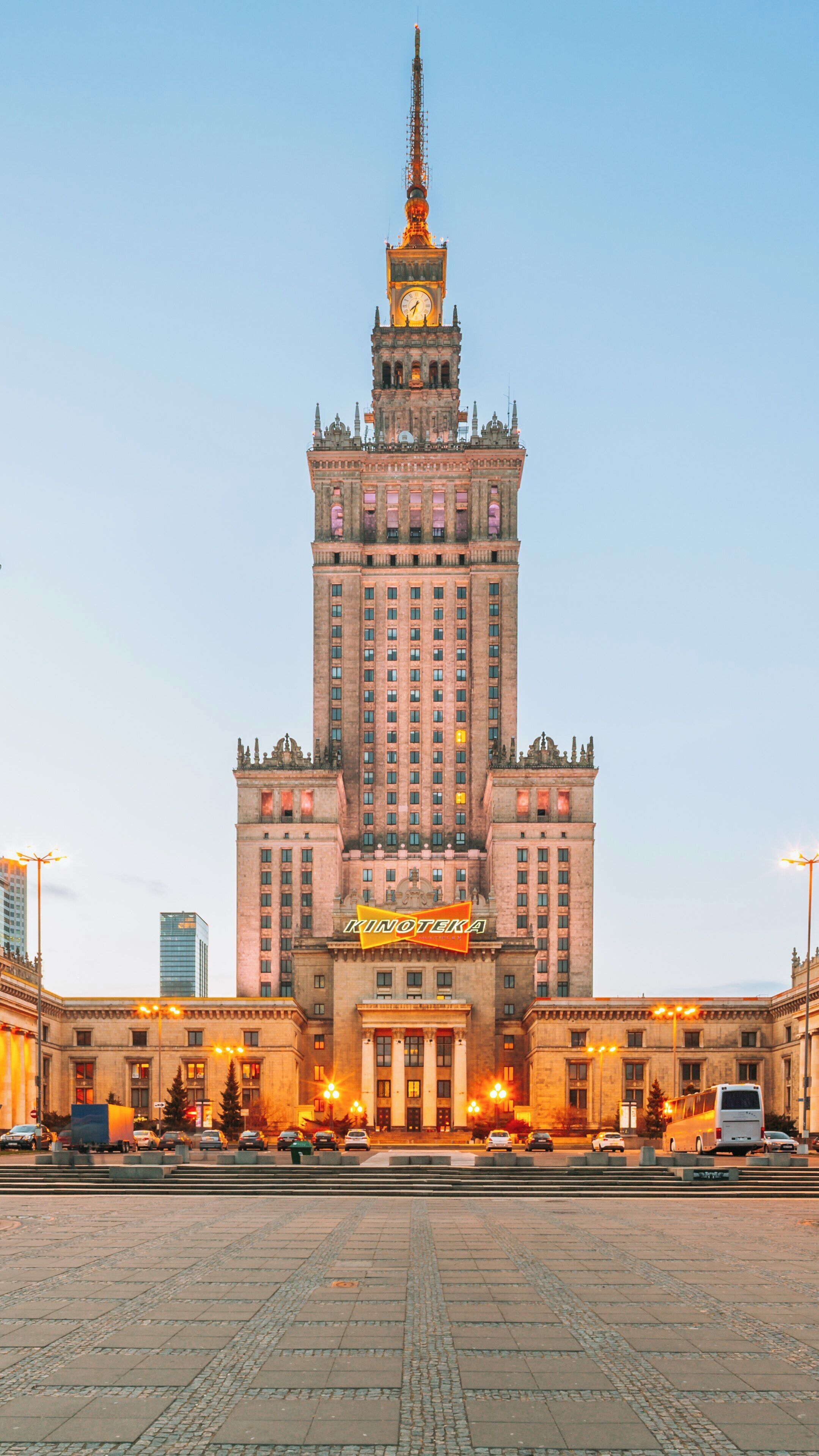 Iconic Palace of Culture and Science stands tall in Srodmiescie, showcasing Warsaw's historical architecture and vibrant city life