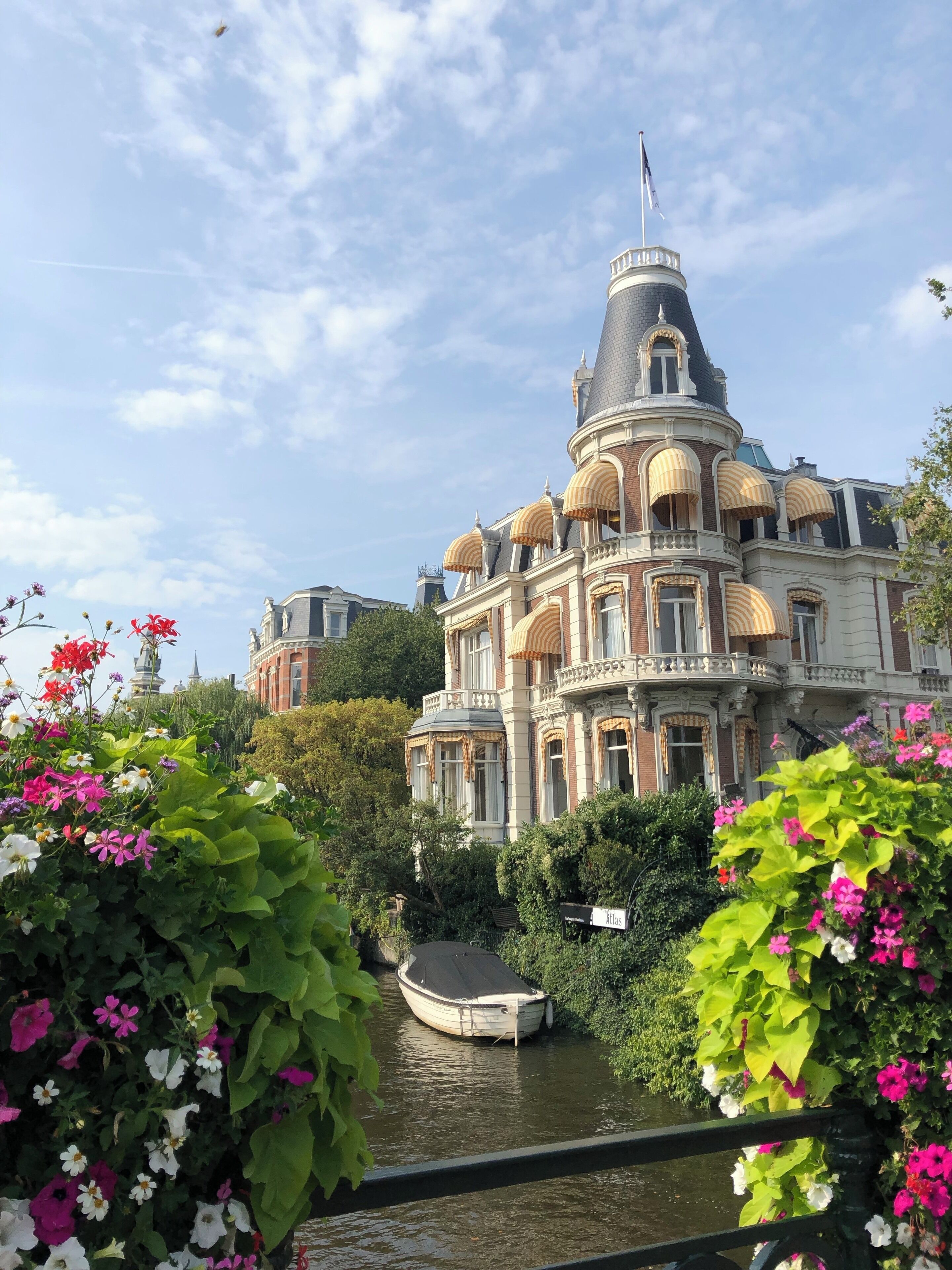 Just leaving the museum across the first canal, one of many places to capture iconic Amsterdam, canals and flowers