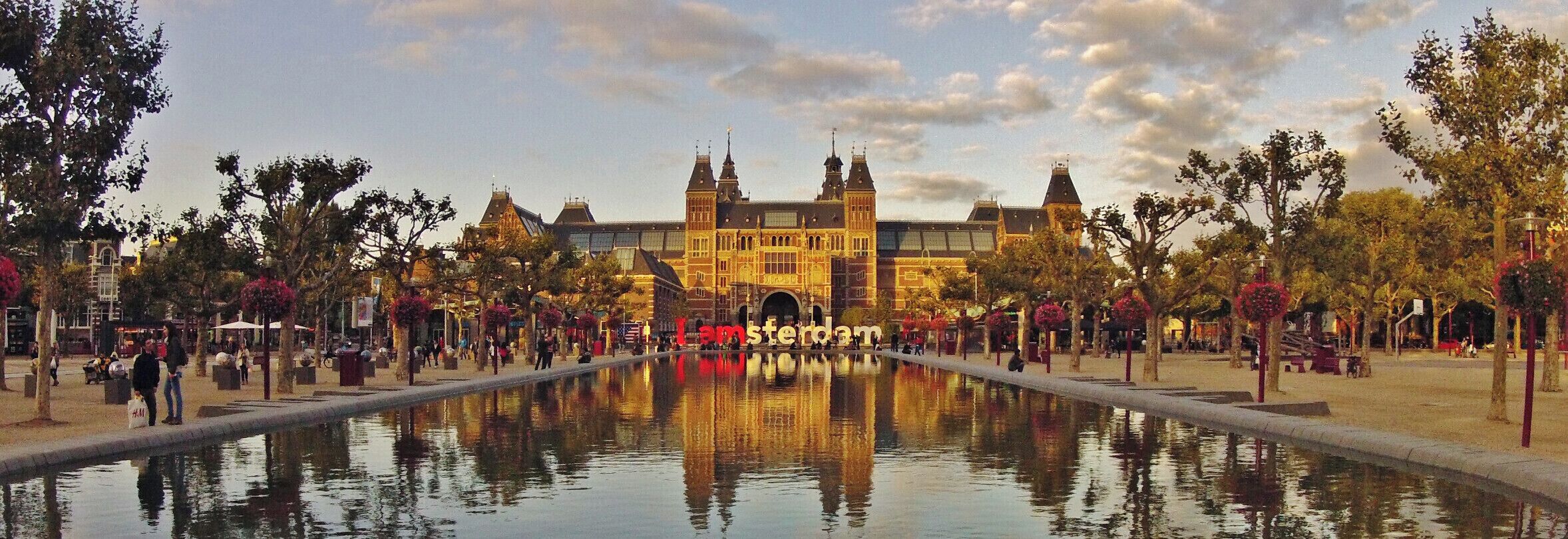 The Rijksmuseum is a Netherlands national museum dedicated to arts and history in Amsterdam. The museum is located at the Museum Square in the borough Amsterdam South, close to the Van Gogh Museum, the Stedelijk Museum Amsterdam, and the Concertgebouw. The museum has on display 8,000 objects of art and history, from their total collection of 1 million objects from the years 1200–2000, among which are some masterpieces by Rembrandt, Frans Hals, and Johannes Vermeer. The museum also has a small Asian collection which is on display in the Asian pavilion.