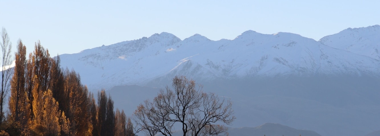 This has been one of the most recent "Instagram stars" when it comes to natural sights.
Once used as a fence post, it now serves as a photogenic prop to the mountains and Ruby Island behind.