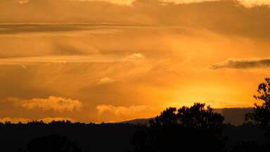 Golden predawn clouds over the hills near Anniston, Alabama, USA