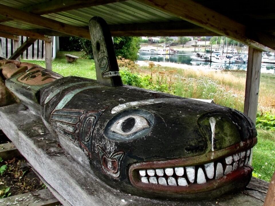 Such a clash of cultures.. the old meets the modern with the motor boats I. The background. These ancient totem poles telling of their family/clan history have been taken down and stored under shelter until they can be restored. I felt so fortunate to be able to see this amazing part of the local culture so up close. Astonishing! 
#Culture