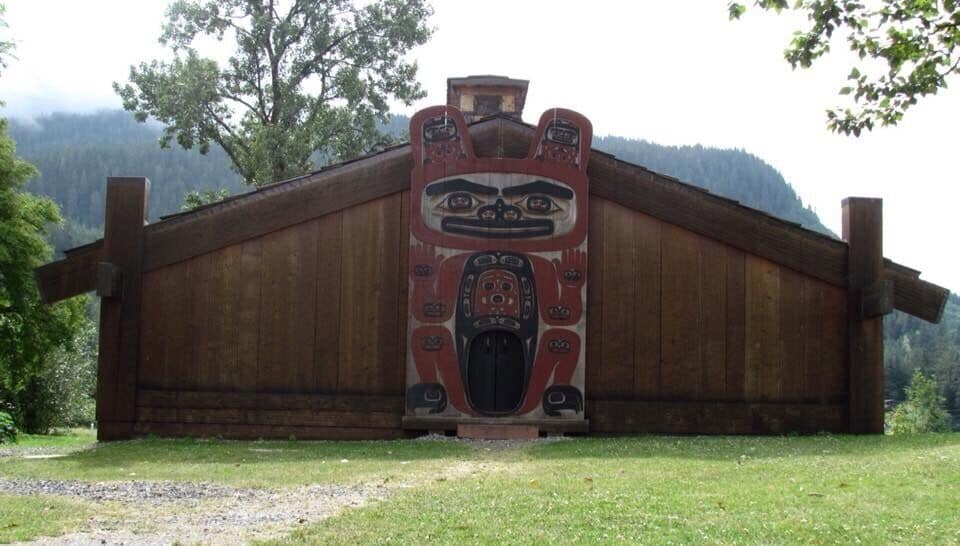 Tlingit Ceremonial House in Wrangell Alaska.
If you go around the back there is a long open shed with 3 very large totem poles lying down that used to stand here but are in need of restoration.
