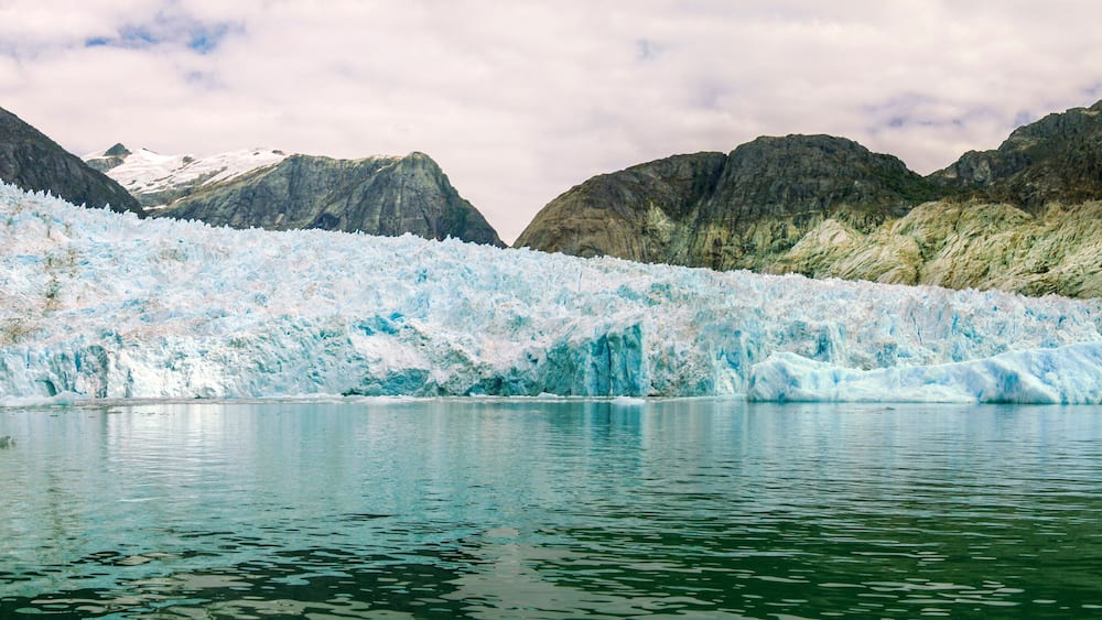 The LeConte Glacier in Southeast Alaska. The glacier is a popular tourist destination, with operators from nearby Petersburg and Wrangell, Alaska, running excursions to its calving face.