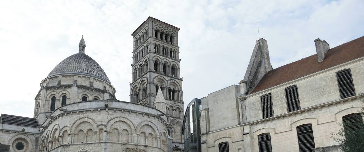 A historic church with a prominent bell tower and dome.