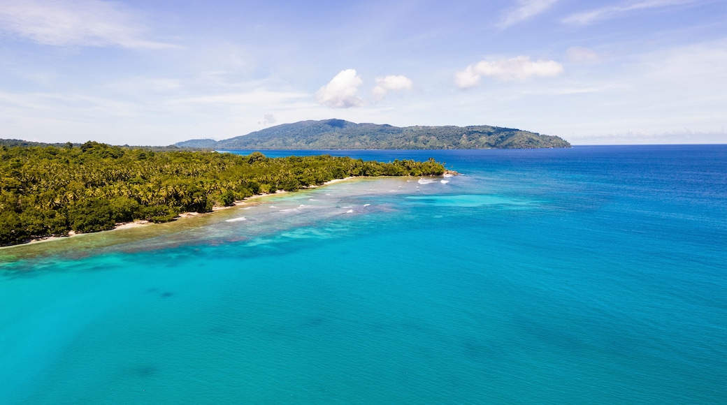 Aerial Drone View of Turquoise Sea of Musho Island, Wewak East Sepik Province, Papua New Guinea.