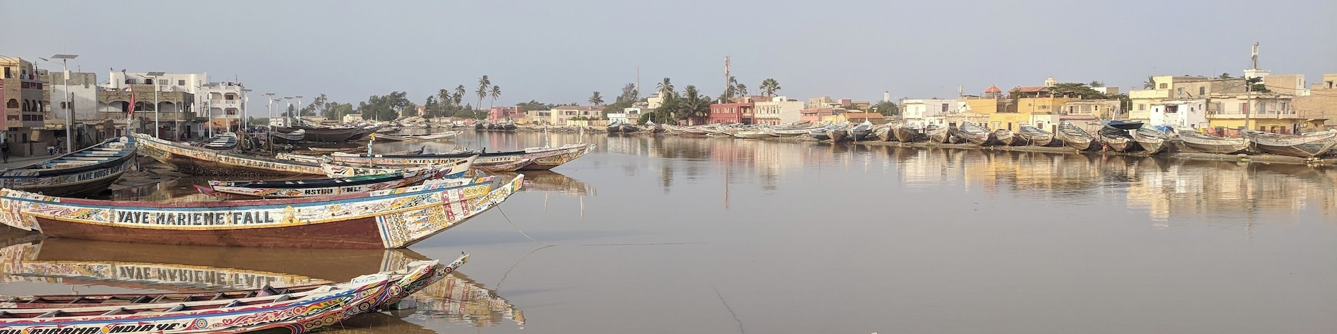 Les pirogues! Colorfully painted, these serve the fishermen well as they capture their fish, for sale at the market or for their own table at home. #culture October 2018
