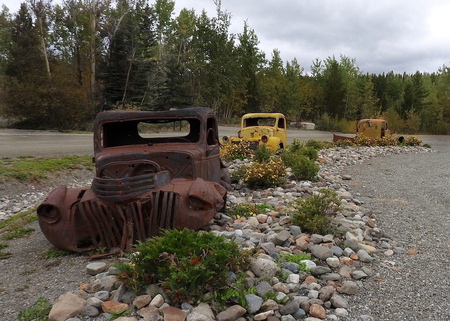 J 0 Junction of the South Canol Road with the Alaska Highway; rest area toilets, a few WWII vehicles from the Canol Project on display, and interpretive signs on the history and construction of the Canol Road. (September 2016)