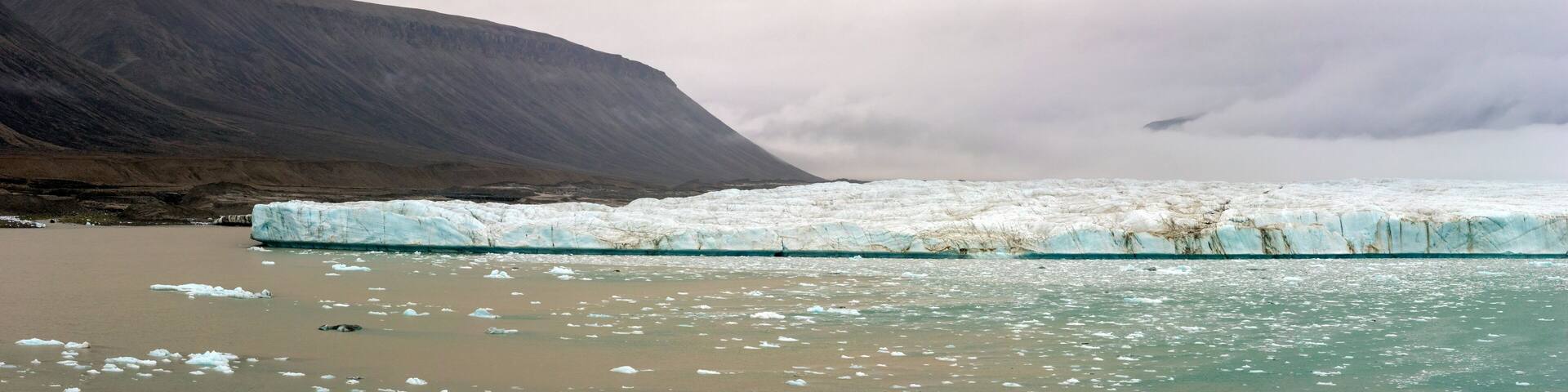 Panorama of a glacier and mountains in Croker Bay, Devon Island, Nunavut, Canada.