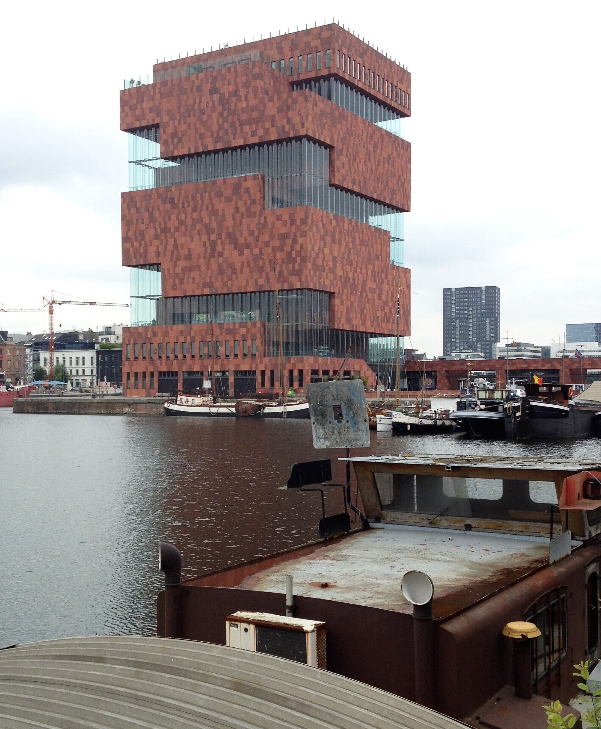 Visitors can ride escalators up to the roof terrace of MAS for panoramic views of Antwerp.