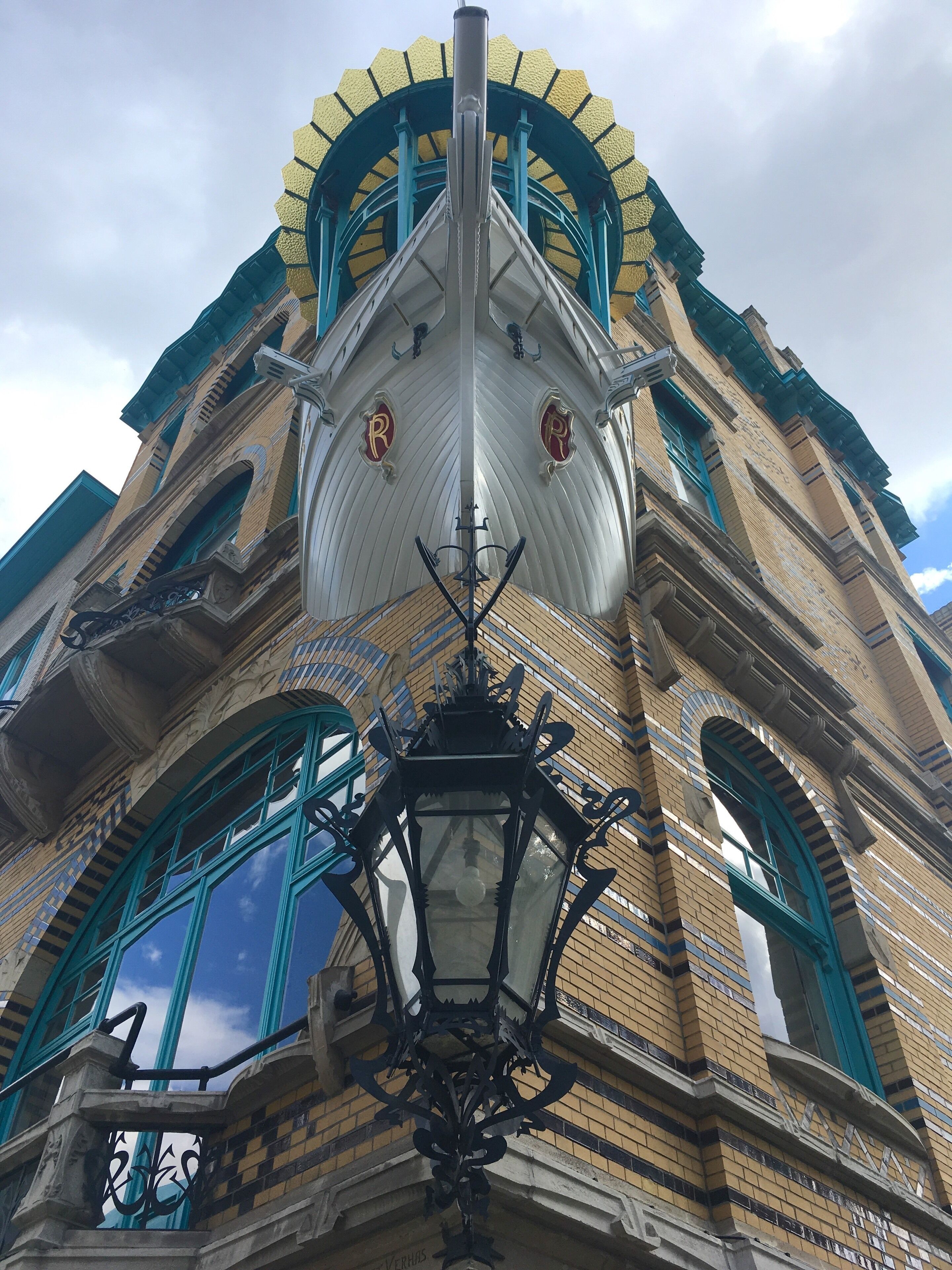 A vessel’s bow on a house...