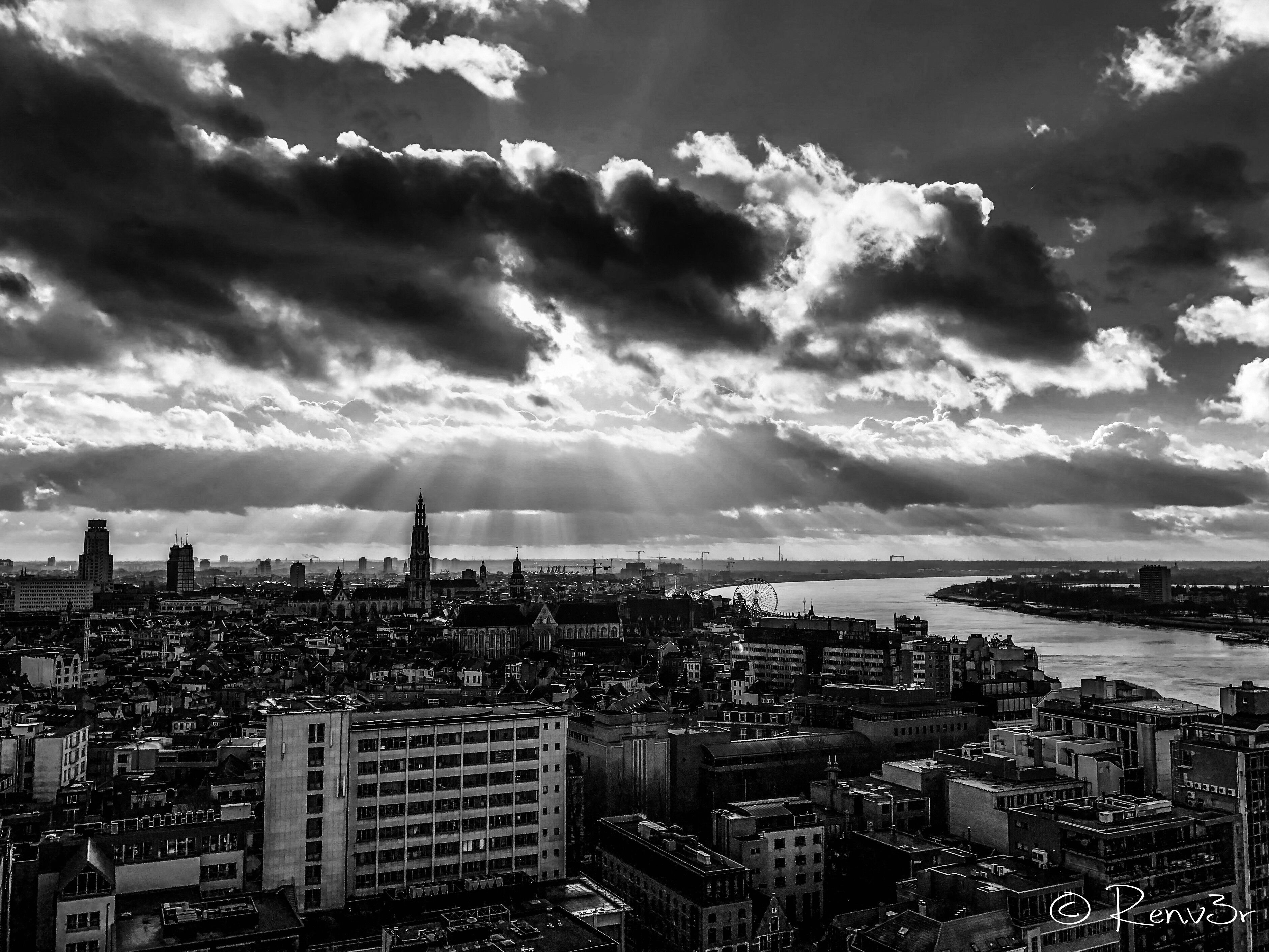 Picture taken at the top of the ‘MAS’ in Antwerp. If I’m not mistaking you can get to the top floor for free. As you can see: ‘ Every cloud has a silver lining’.