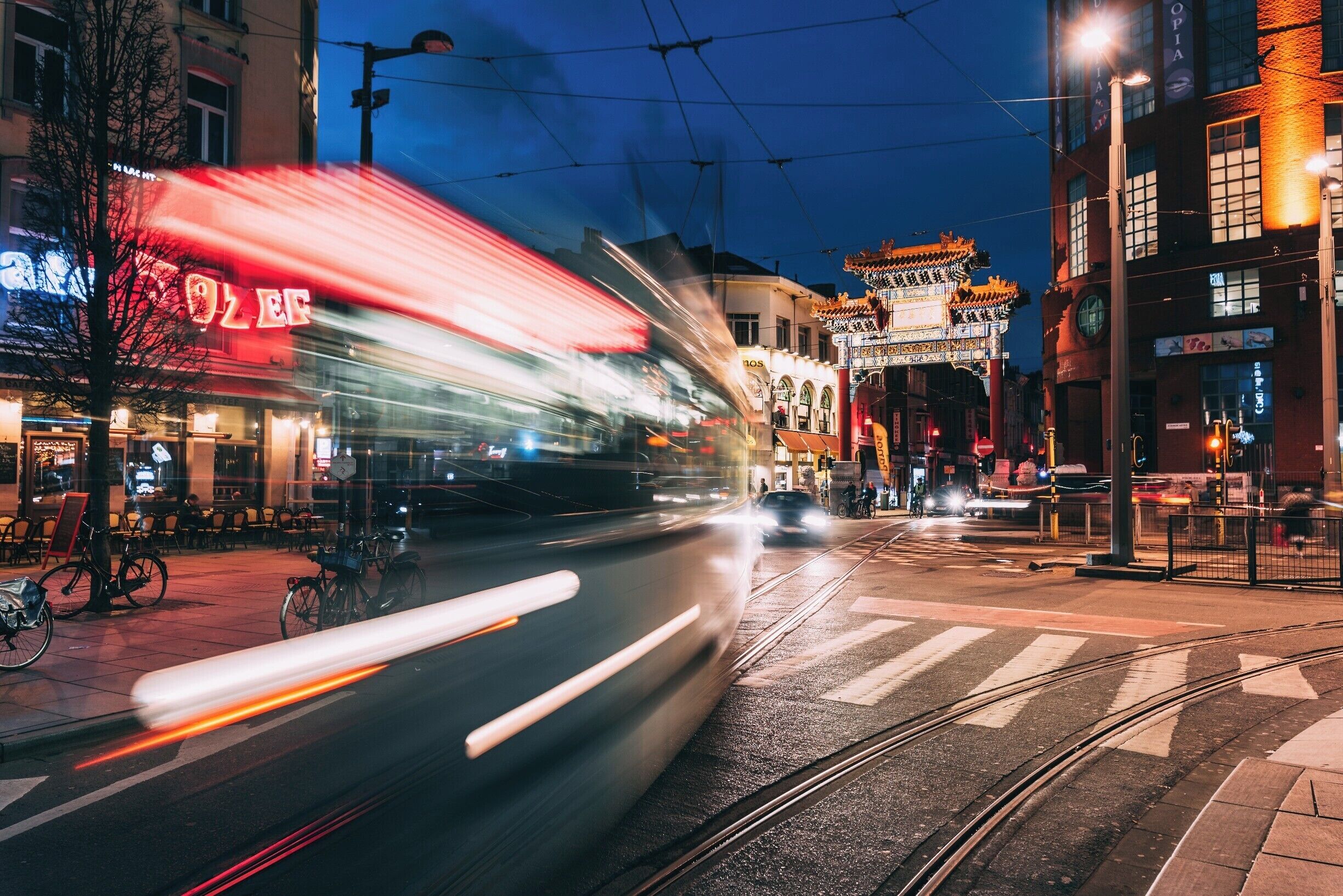 Always fun hanging around chinatown in antwerp, alot more colors and unique people in the streets. I think this was like a 1 second exposure and i like how it turned out with the tram passing by. #urbanjungle