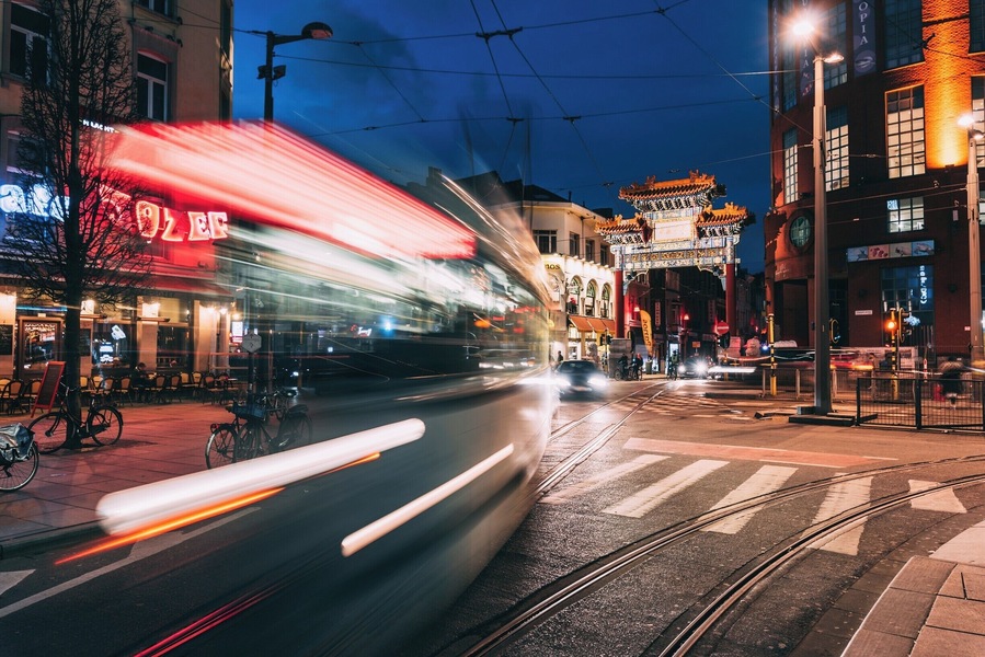 Always fun hanging around chinatown in antwerp, alot more colors and unique people in the streets. I think this was like a 1 second exposure and i like how it turned out with the tram passing by. #urbanjungle