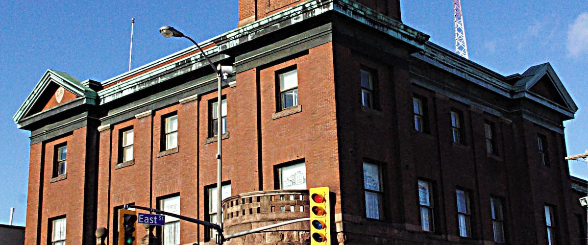 Sault Ste. Marie is a city in Ontario, Canada. It's on the St. Marys River, north of the U.S. border, near 3 of the Great Lakes. It’s known for the 19th-century Sault Ste. Marie Canal, lined with red sandstone buildings.