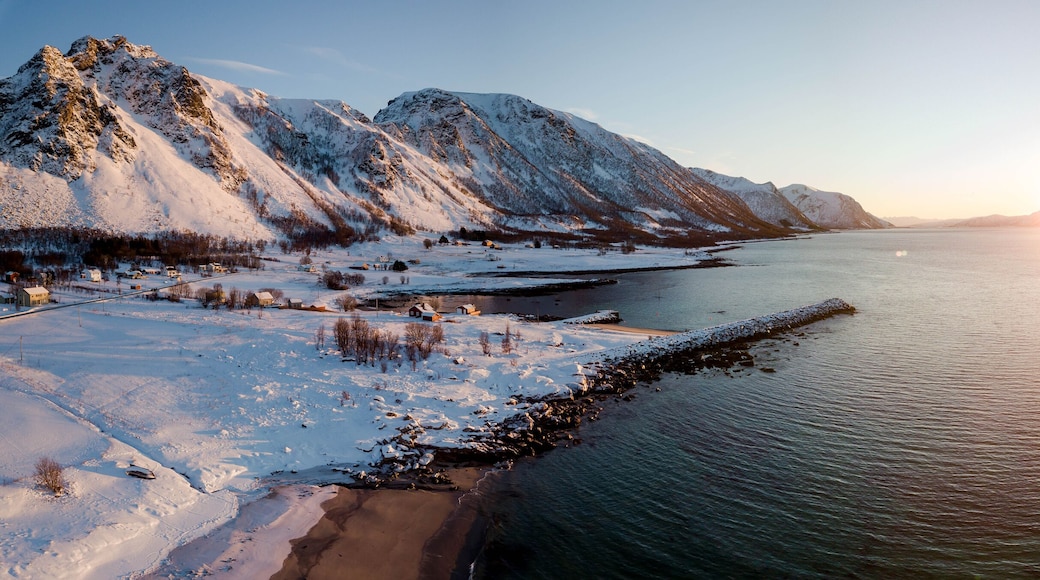 Aerial drone view of panoramic sunset of snow
and ice covered Norway Andøya close to Andenes