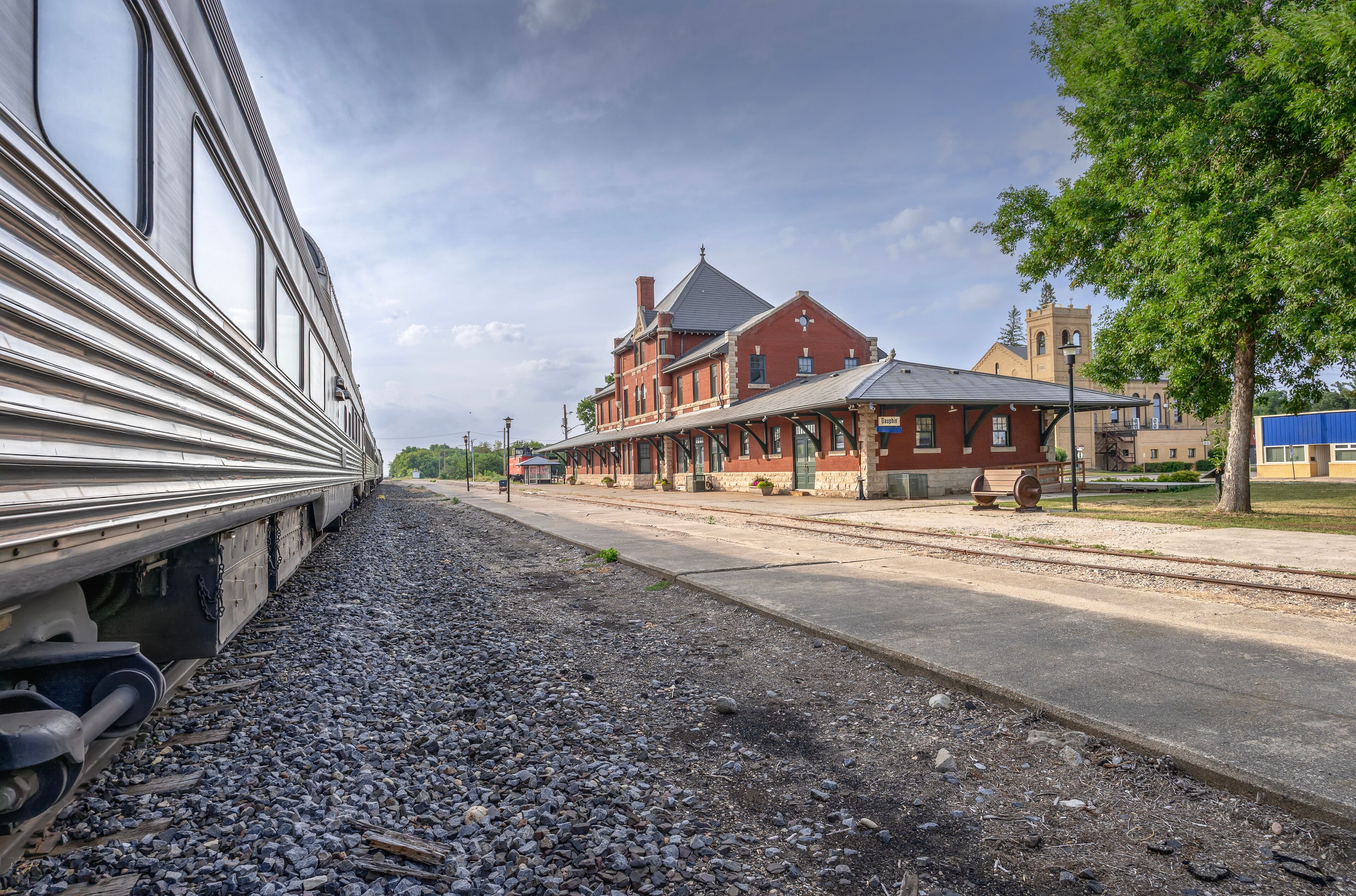 Stationary passenger train at the historic Dauphin train station in Manitoba, Canada