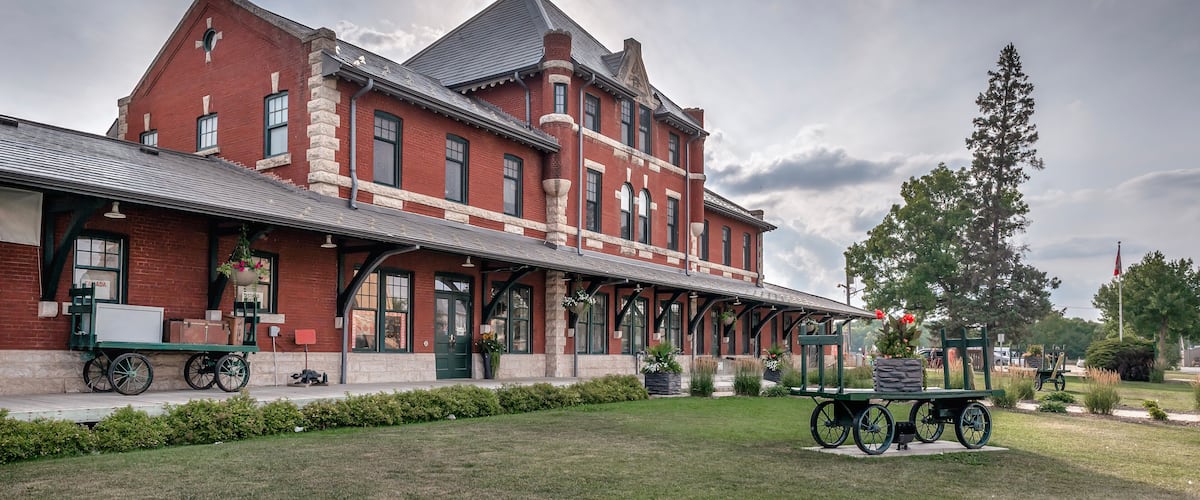 Exterior of the historic brick and limestone train station in the town of Dauphin, Manitoba, Canada