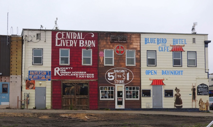 Many of the buildings in downtown Dawson Creek are part of a large mural project that took place over several years beginning in 2000. The mission of the project is city beatification and to offer a positive experience for visitors to the community. Murals can be found in back alleys downtown and on the sides of some prominent buildings.
#Mural #OnTheRoad