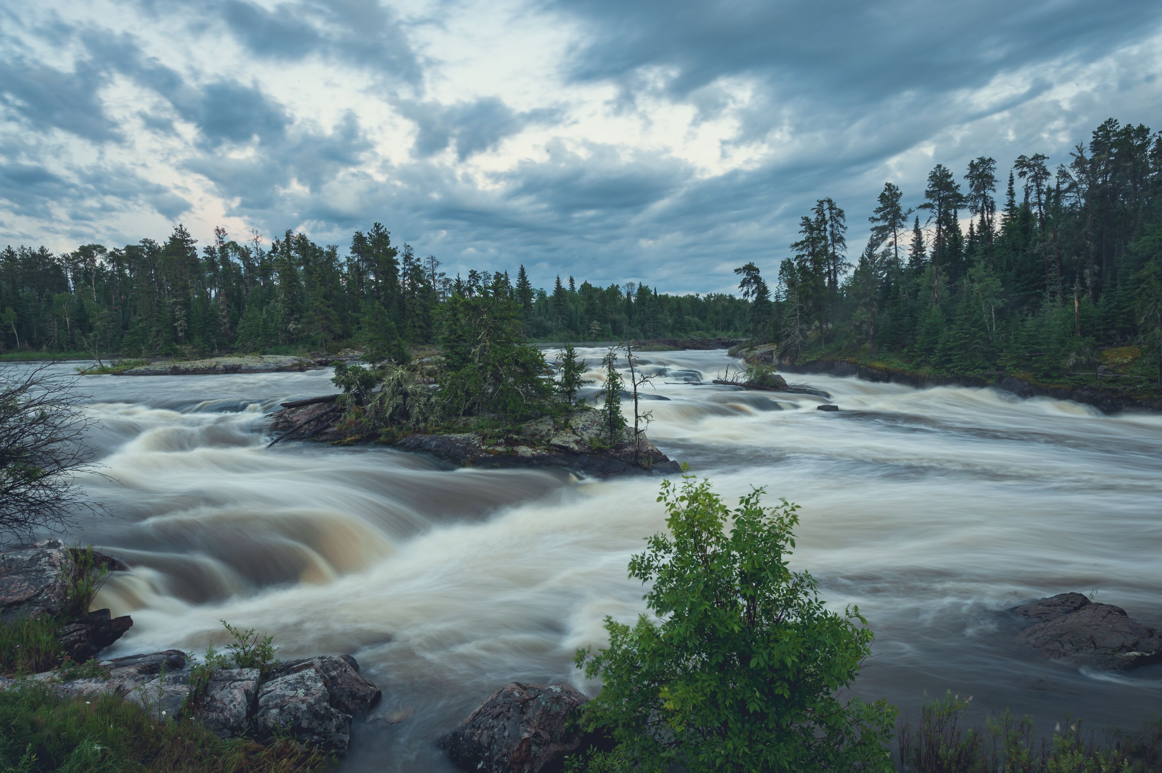 Wabigoon River rapids at sunset, near Vermillion Bay.