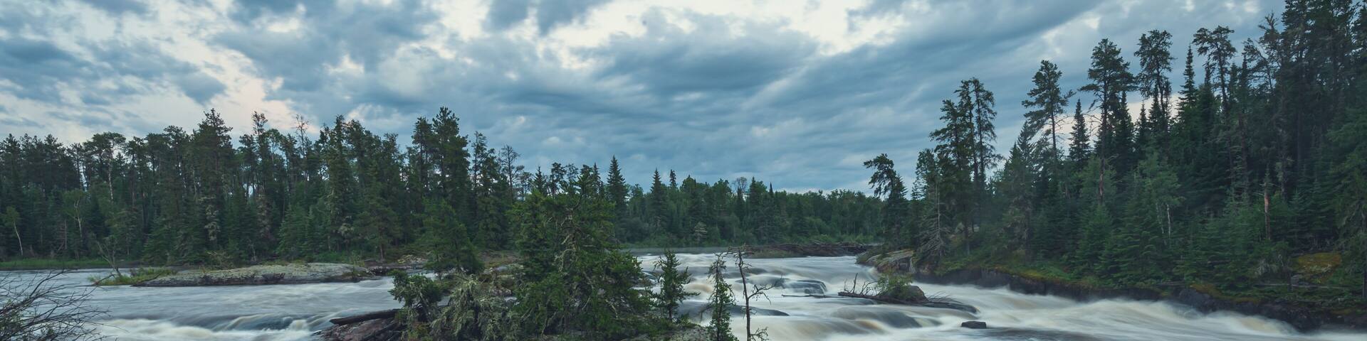 Wabigoon River rapids at sunset, near Vermillion Bay.