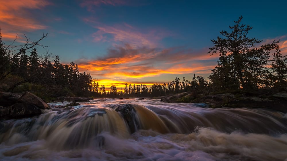 A beautiful sunrise over the Wabigoon River located in Northwest Ontario, Canada.