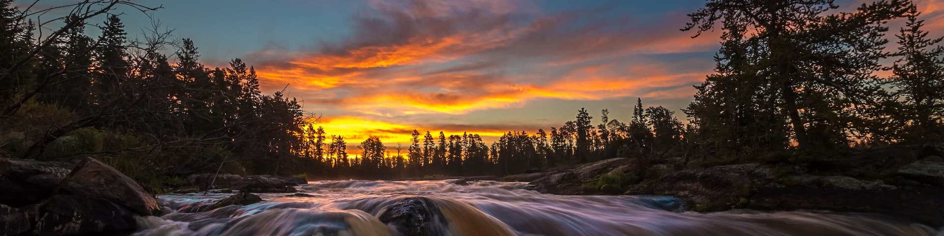 A beautiful sunrise over the Wabigoon River located in Northwest Ontario, Canada.