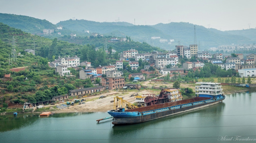Yichang is a town developed recently in the Hubei province of China due to the construction of the Three Gorges Dam which is the largest hydro-power plant in the world. This area is rich in natural beauty and it's really mountainous. I definitely recommend you this amazing place if you have any spare time in China.