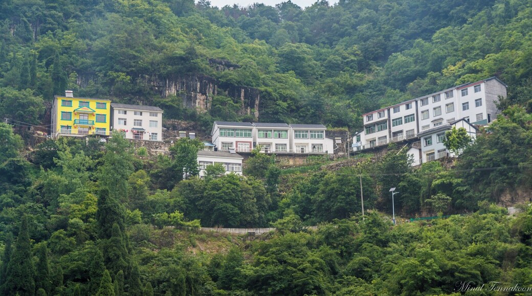 Yichang is a town developed recently in the Hubei province of China due to the construction of the Three Gorges Dam which is the largest hydro-power plant in the world. This area is rich in natural beauty and it's really mountainous. I definitely recommend you this amazing place if you have any spare time in China.