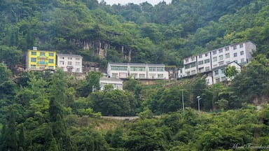 Yichang is a town developed recently in the Hubei province of China due to the construction of the Three Gorges Dam which is the largest hydro-power plant in the world. This area is rich in natural beauty and it's really mountainous. I definitely recommend you this amazing place if you have any spare time in China.