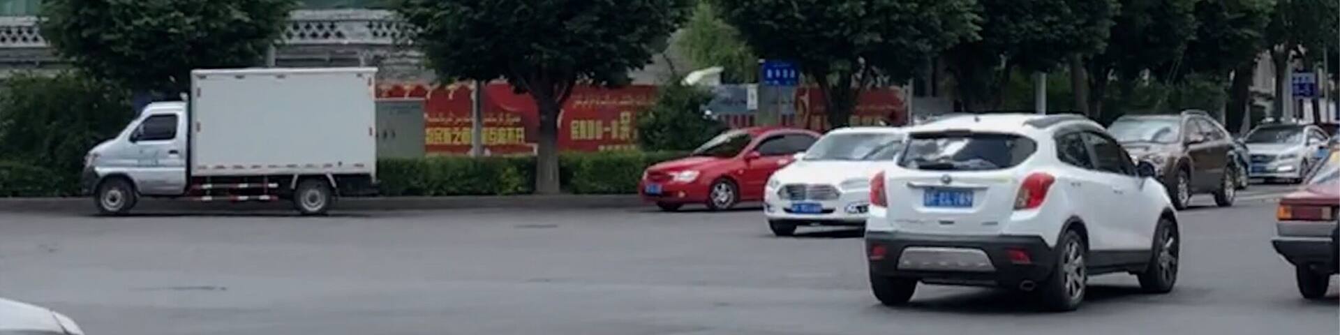 A Buddhist temple in front of a Mosque in Yining, China.