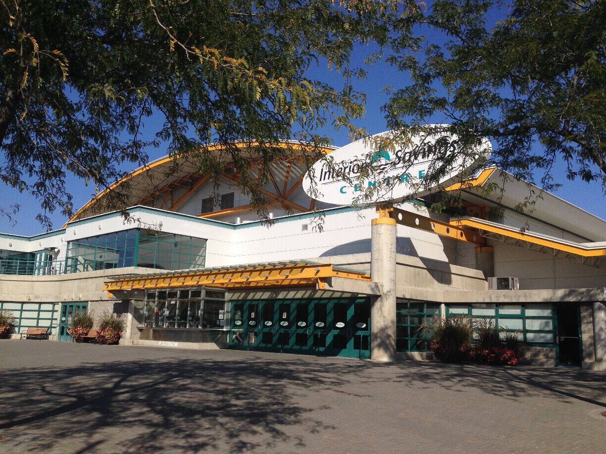 A modern building with a large sign reading "Interior Design Center".